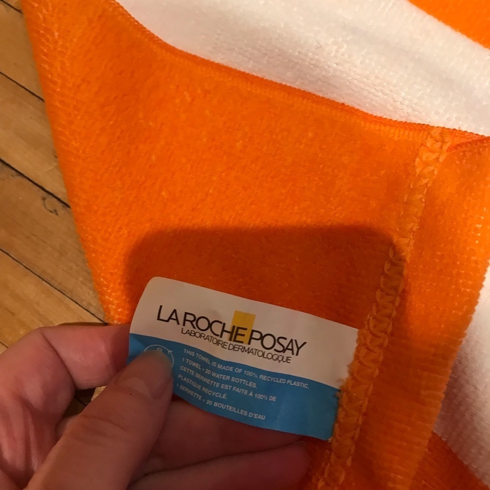 La Roche-Posay Orange and White Striped Towel​​​​ - Picture 2 of 4